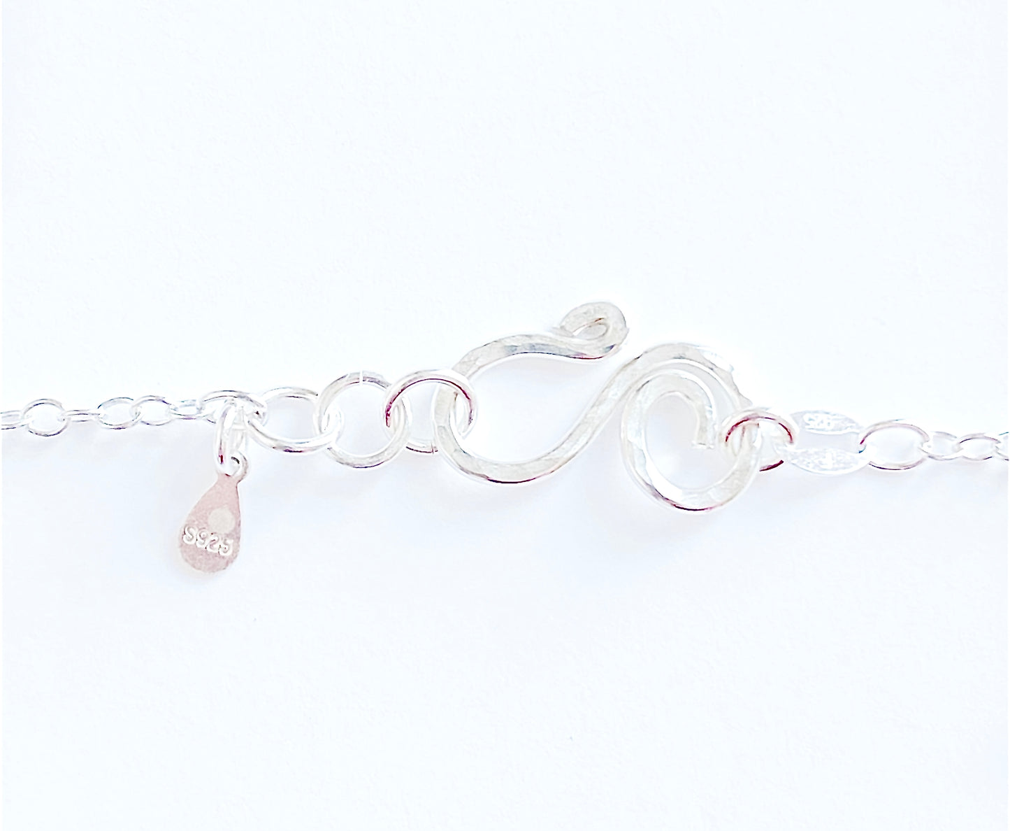handmade sterling swirl clasp
