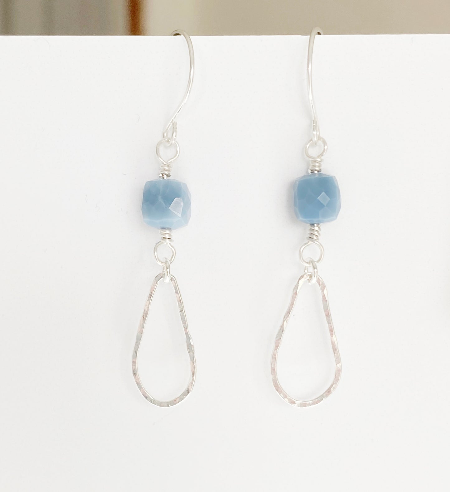 Blue Drops earrings on white board