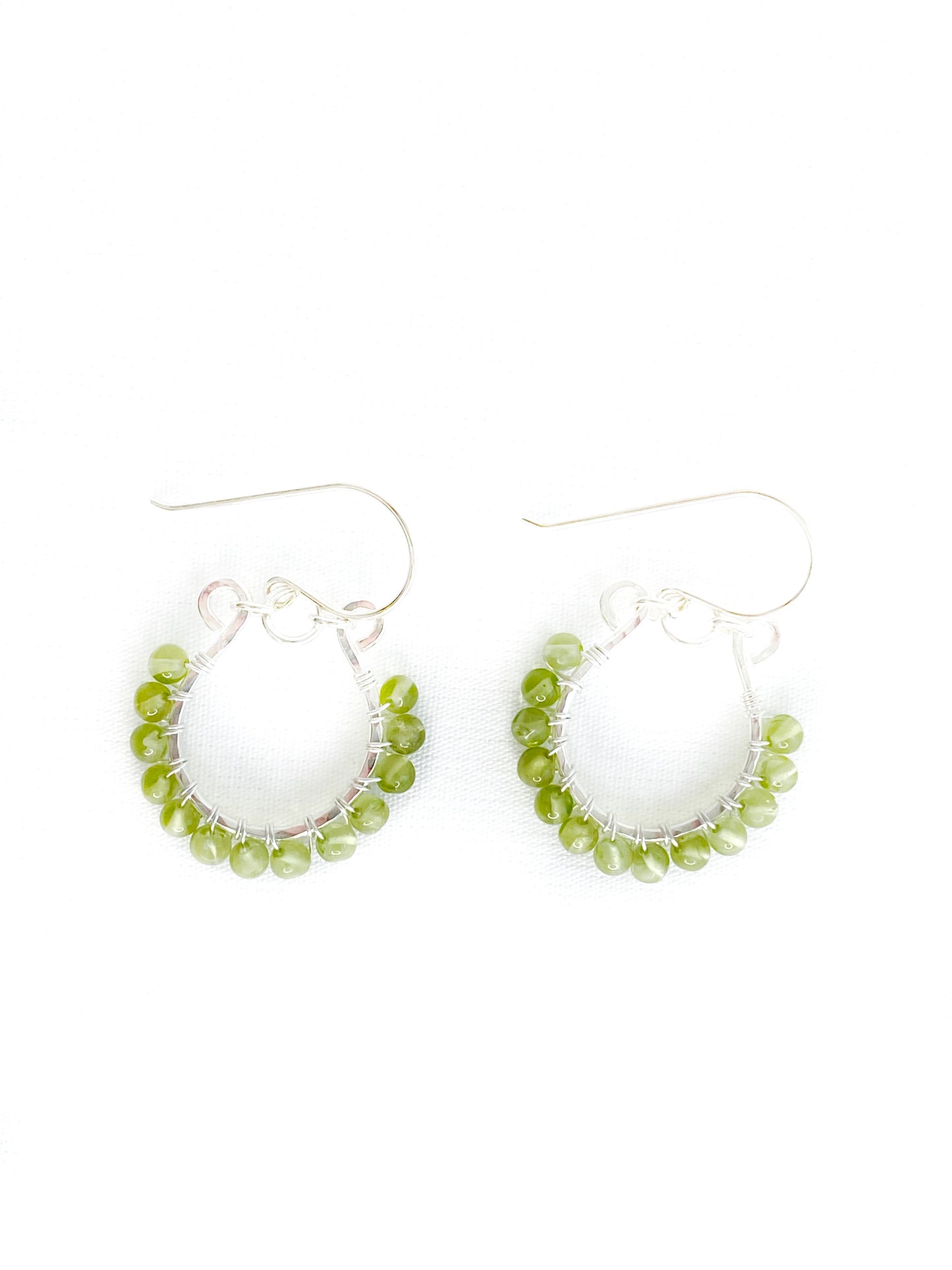 TrueHappinessDesigns - small peridot round beads wire wrapped around a sterling tulip strung from handmade sterling ear wires