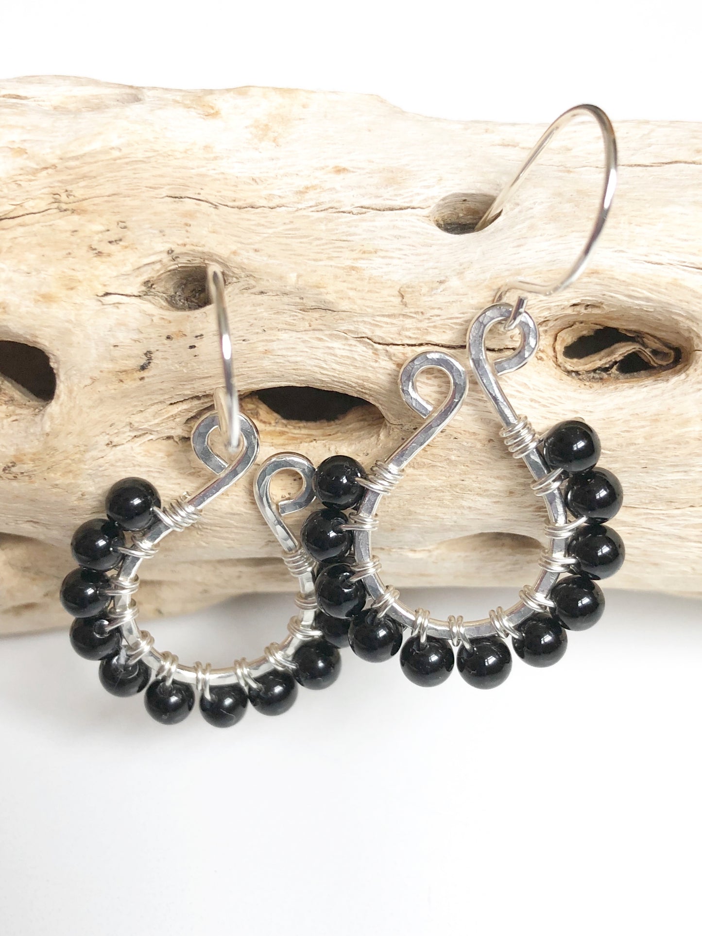 Black Onyx beads wire wrapped onto Sterling silver earrings