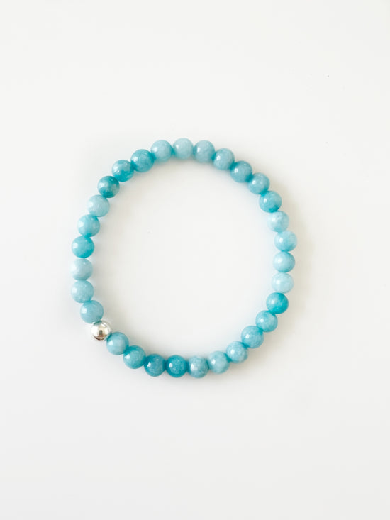 Simple modern Blue Chalcedony stretch bracelet with one Sterling Silver bead