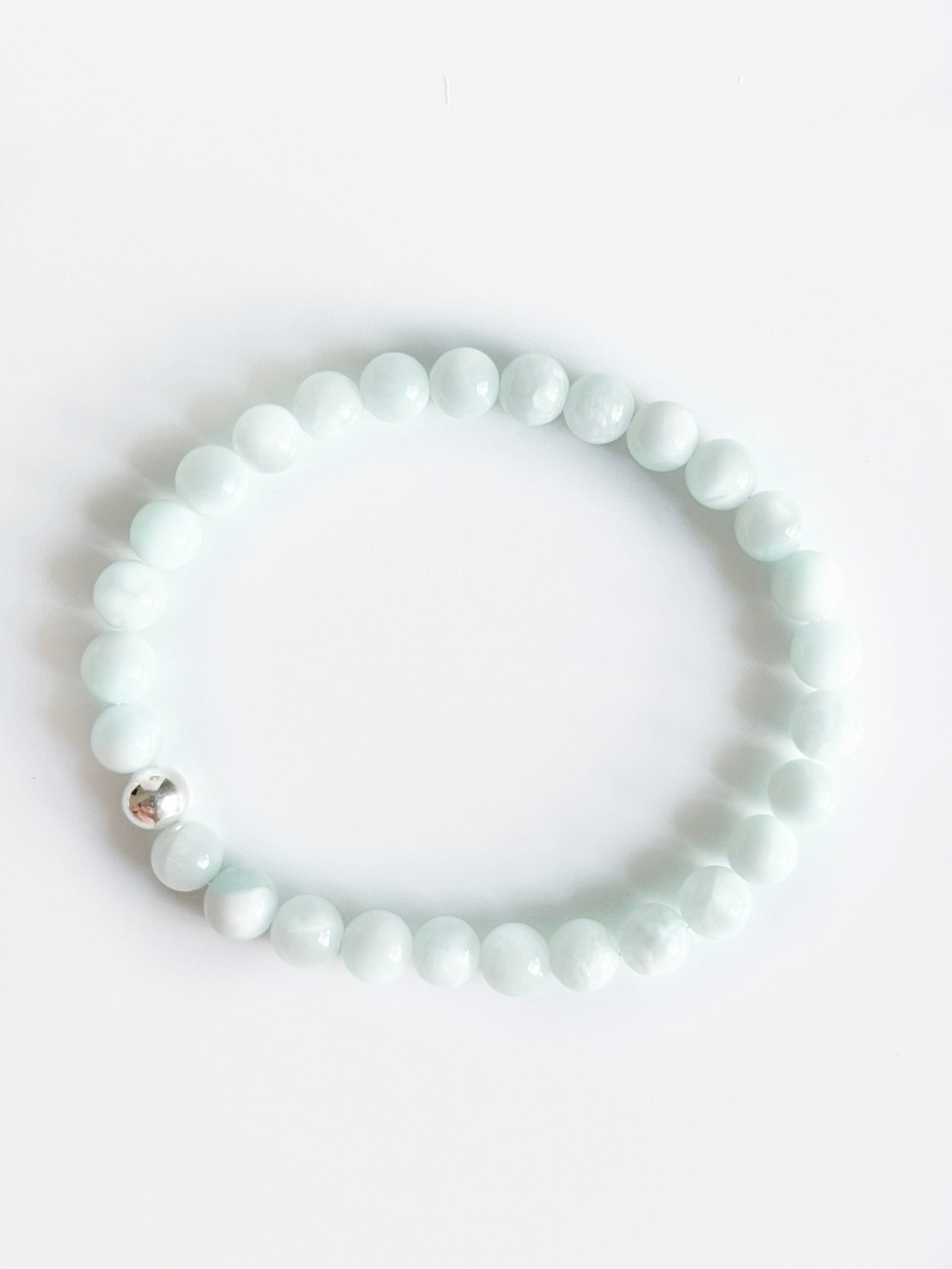 Simple modern everyday green moonstone stretch bracelet with one sterling silver bead