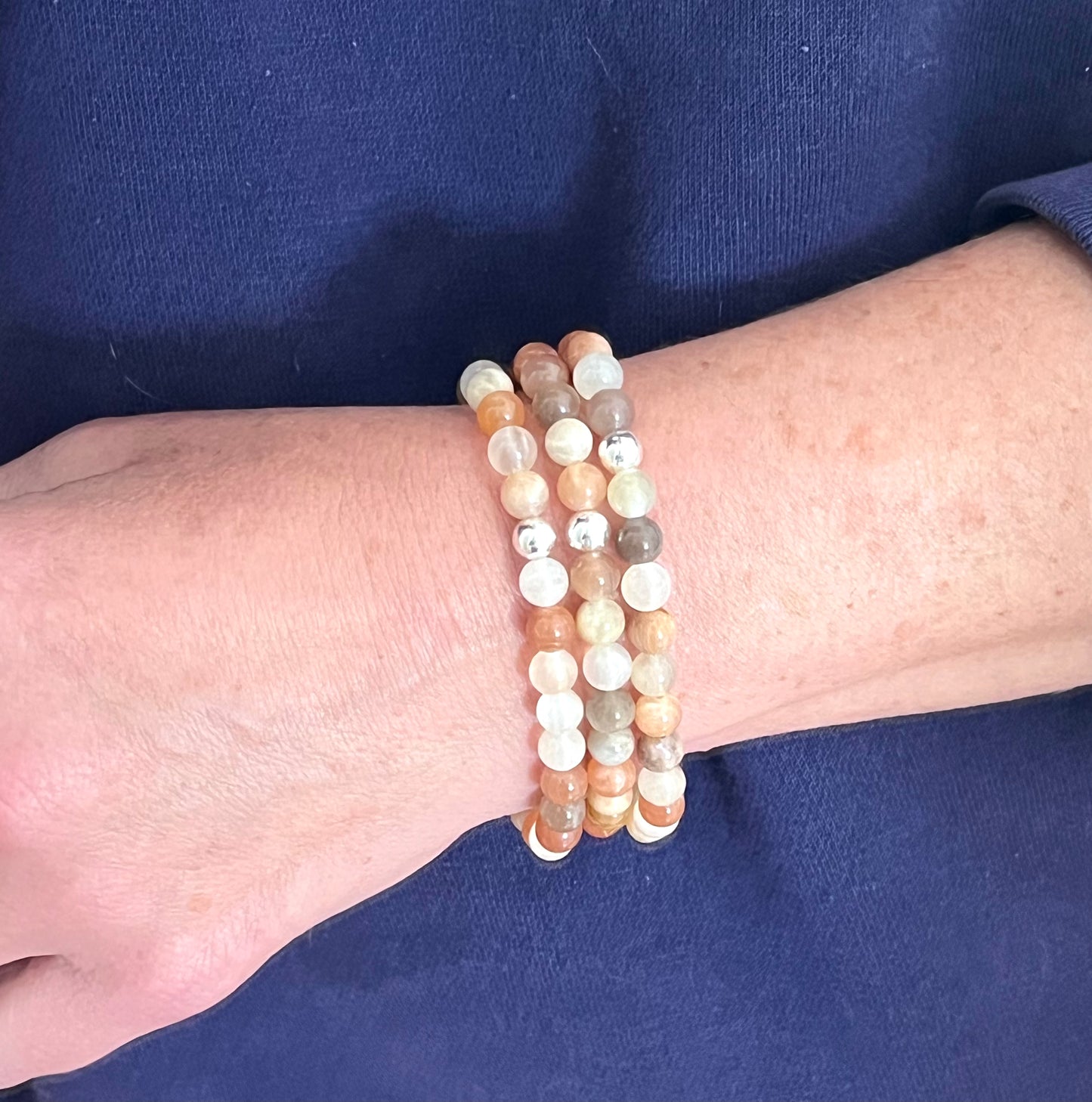 peach, grey and white moonstone stretch bracelet w/ one sterling silver connector bead