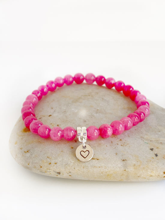 Load image into Gallery viewer, Rhodochrosite and sterling stretch bracelet with stamped heart charm
