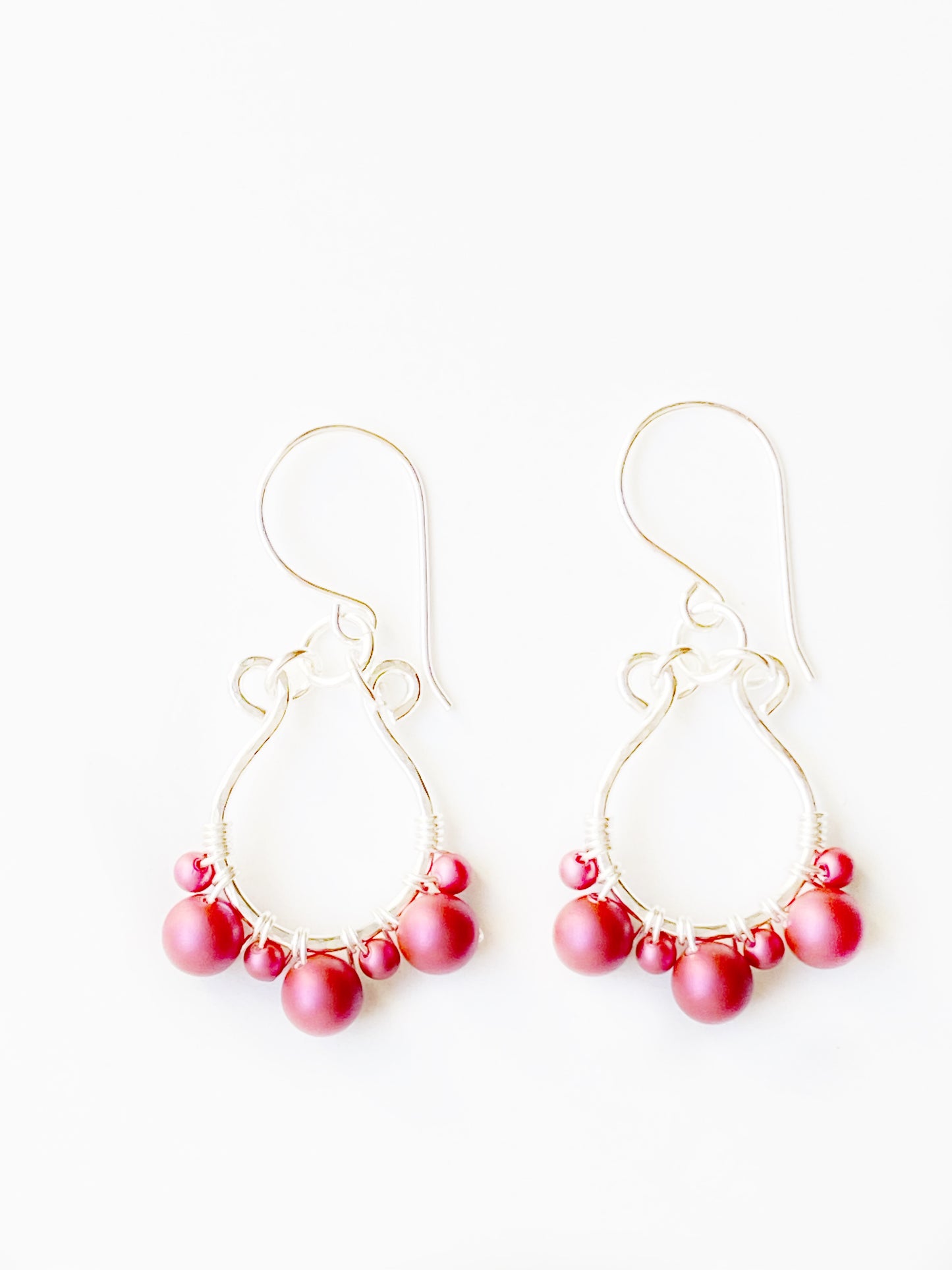 Load image into Gallery viewer, Mulberry Sunset dark pink large and small swarovski pearl beads wire wrapped to sterling silver tulip shaped components hung from sterling silver ear wires with three silver rings
