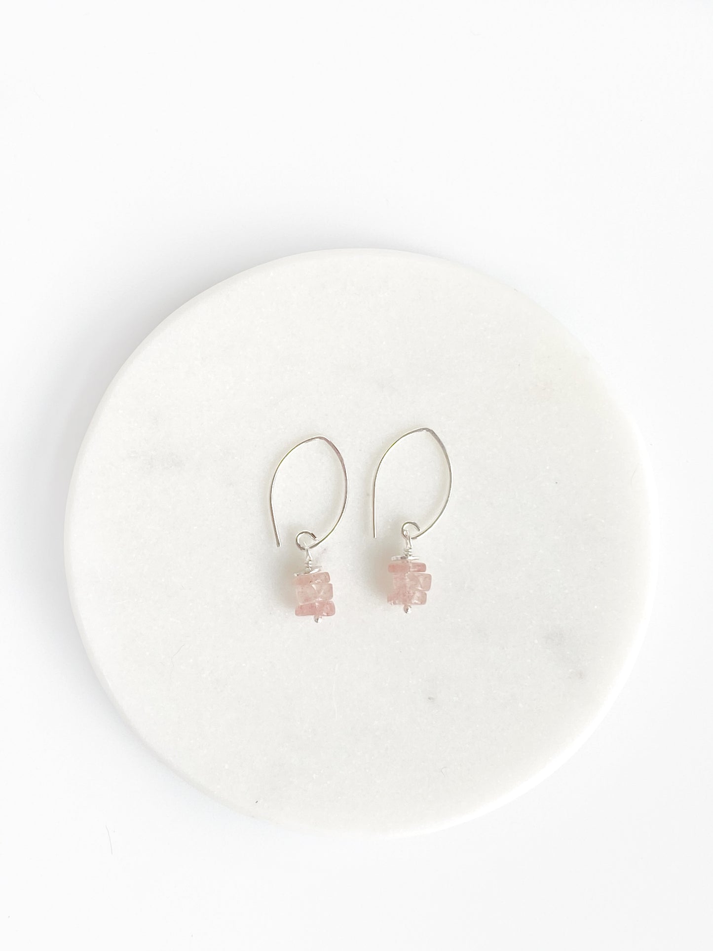 Strawberry Quartz and sterling silver earrings. Almond shaped sterling handmade ear wires with 3 strawberry quartz heishi beads and a round silver spacer bead. They measure 1 1/4 inches